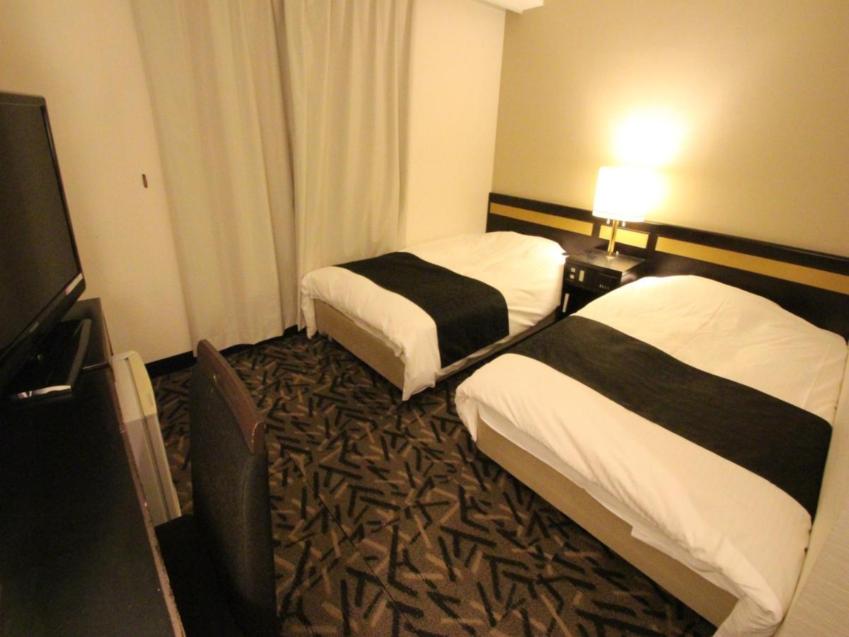 Apa Hotel Komatsu Grand Bagian luar foto